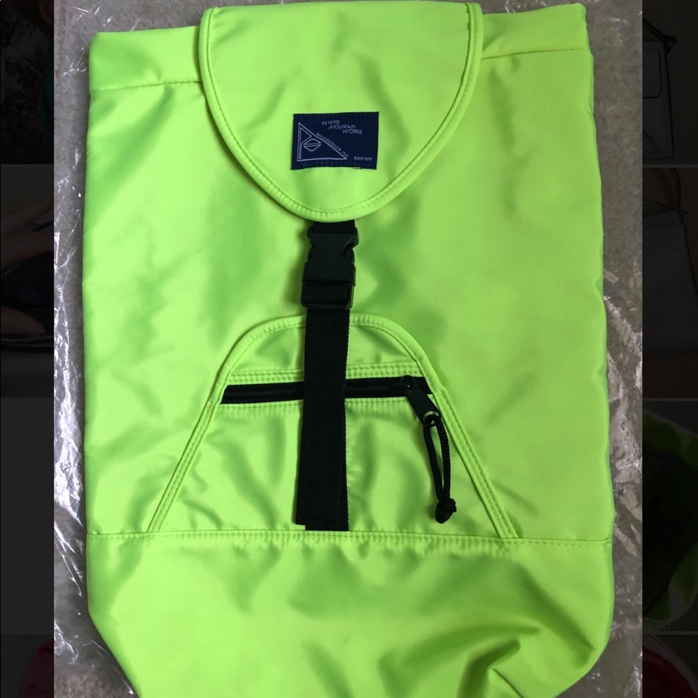 Neon green back pack from urban outfitters